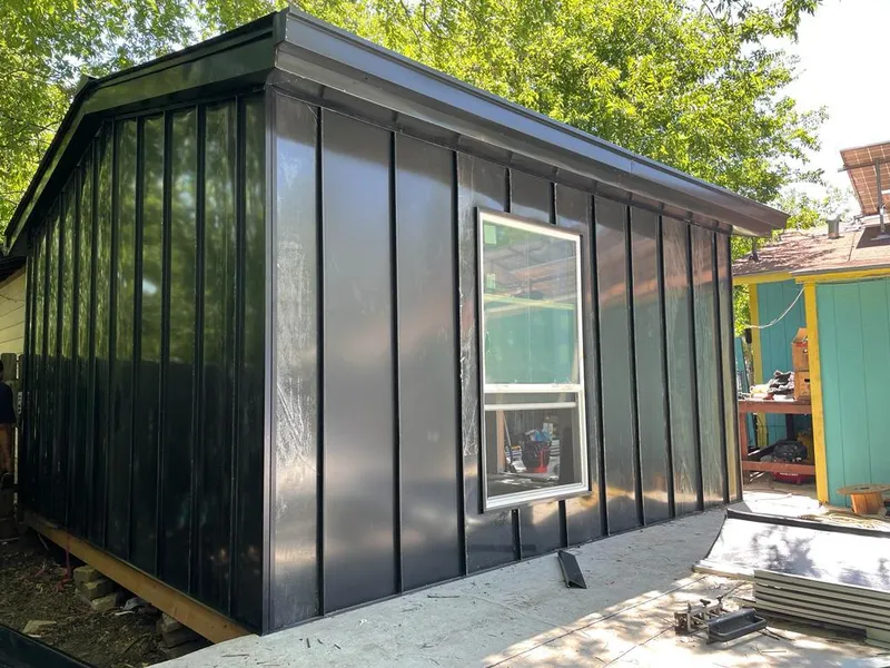 Black standing seam metal wall panels for Roof Inspection in Lincolnwood