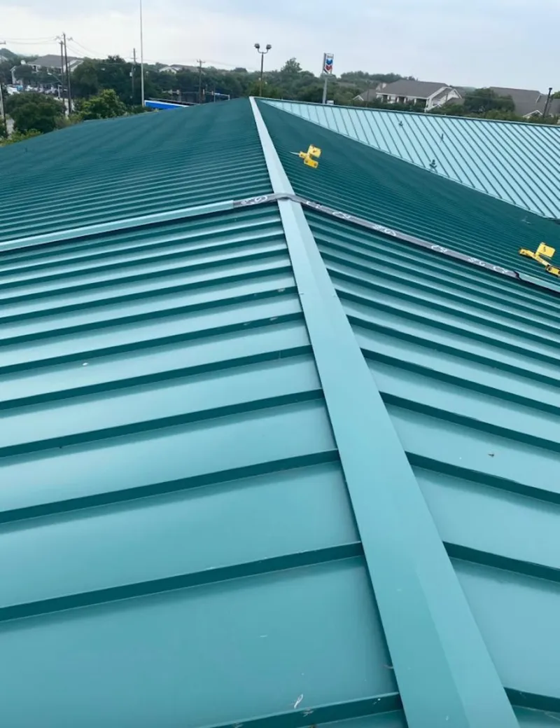 Green commercial metal roof ridge and valley for Metal Roof Repair in Lincolnwood